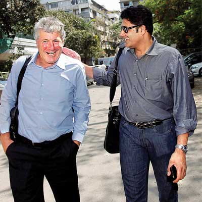 Anil Kumble catches up with former India coach John Wright at the Cricket Centre in Mumbai on Friday.