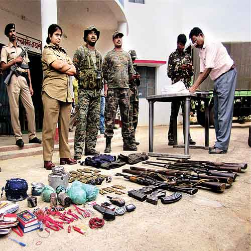 The arms, ammunition and other items recovered after a fight two rival Maoists factions in Jharkhand.