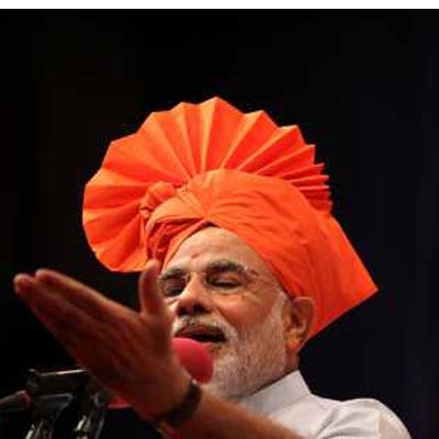 Gujarat chief minister Narendra Modi addressing the party meet in Gandhinagar on Tuesday, December 25, 2012