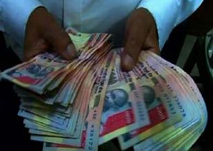 Rupee slumps to record low; bonds, stocks slump 