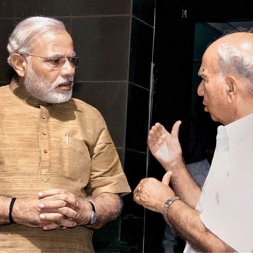 Gujarat chief minister Narendra Modi with former Himachal CM Shanta Kumar at Gandhinagar on Thursday.
