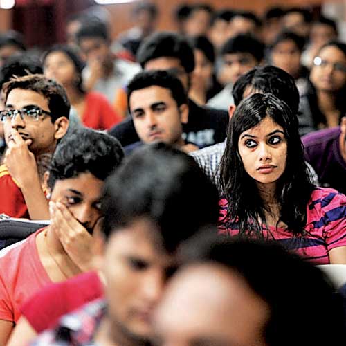 Aspiring managers listen in rapt attention as coaching experts talk about how to deal with the quantitative analysis section of CAT, in Bangalore on Sunday.