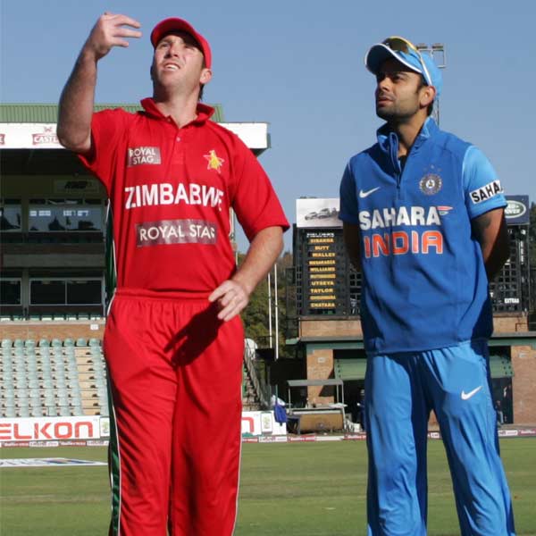 Zimbabwe captain Brendan Taylor (L) and Indian captain Virat Kohli (R)
