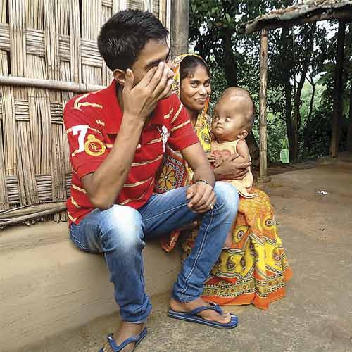 Roona with her parents