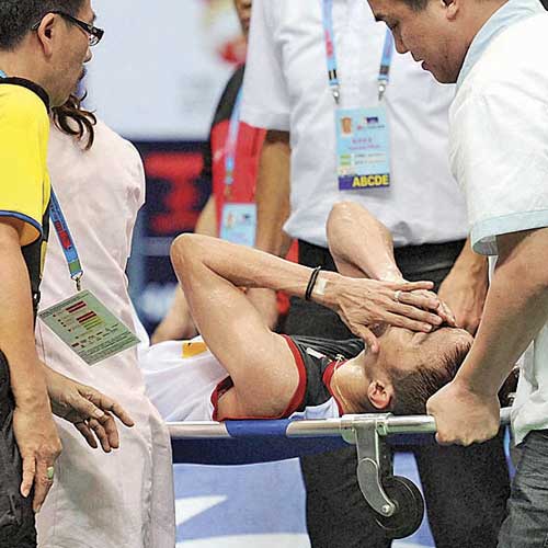 Lee Chong Wei had to be stretchered off after the World's final in China.