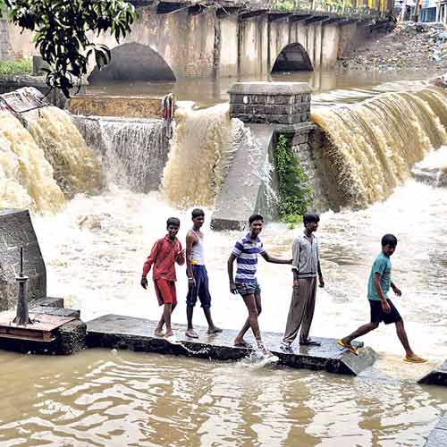 Youths enjoy after rain stopped on Sunday afternoon