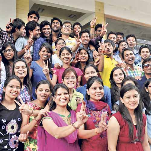 Students celebrate at Nahata Coaching class after the ICSI declared CS result on Sunday.