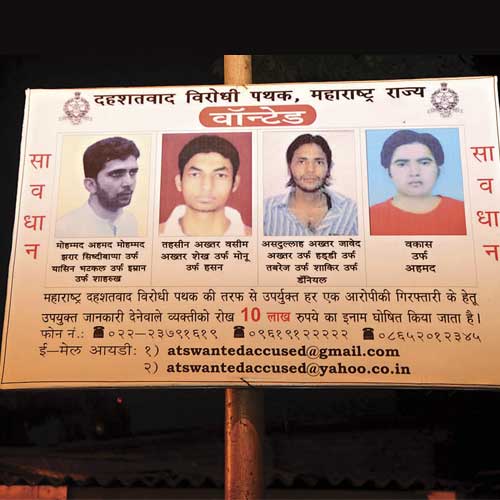 A poster showing four most wanted terrorists, including Yasin Bhatkal, put up at a busy junction in the city by the Anti-Terrorism Squad of the Mumbai Police.