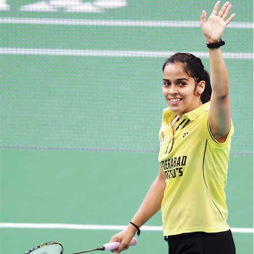 Hyderabad Hotshot's Saina reacts after defeating Warriors' Sindhu in IBL final in Mumbai on Saturday.