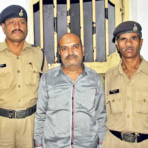 Accused in police custody.