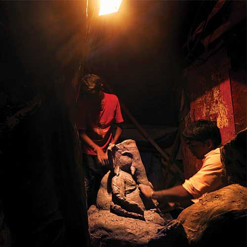Idol-makers prepare a Ganesha statue with eco-friendly materials at their tent in Lower Parel on Sunday.