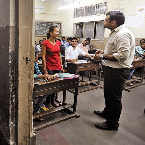 Mayur Dave, a banker, takes English classes at the Modern Night School near his house in Mumbai Central.