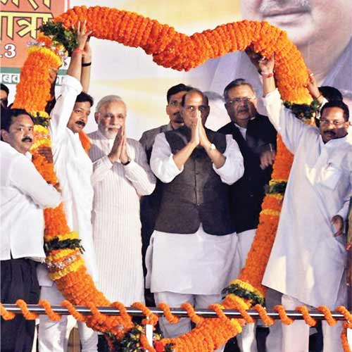 BJP president Rajnath Singh, Gujarat chief minister Narendra Modi and Chhattisgarh chief minister Raman Singh at a rally as part of the latter's Vikas Yatra 2013, in Ambikapur on Saturday.