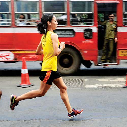 Nilam Rajput on way to winning the women's race in Mumbai on Sunday.