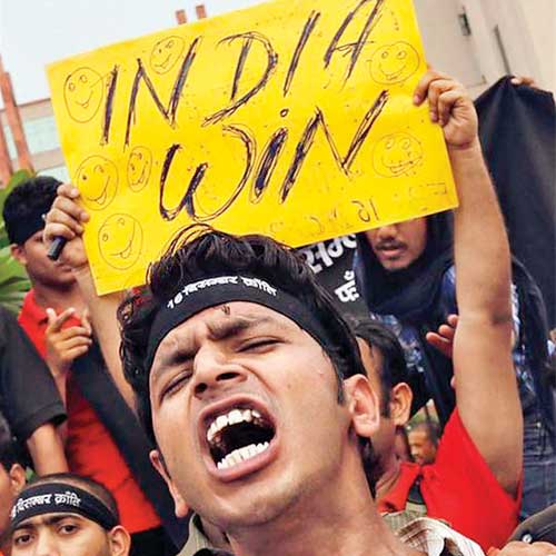 A demonstrator shouts slogans outside a court in New Delhi on Friday.