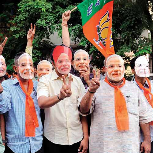 Narendra Modi's supporters in Ahmedabad celebrate his anointment as the BJP's prime ministerial candidate for the next Lok Sabha elections.