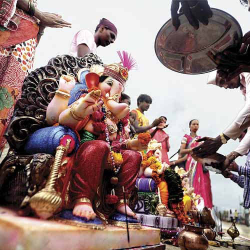 Devotees bid adieu to Lord Ganesha at Girgaum Chowpatty on the seventh immersion day.