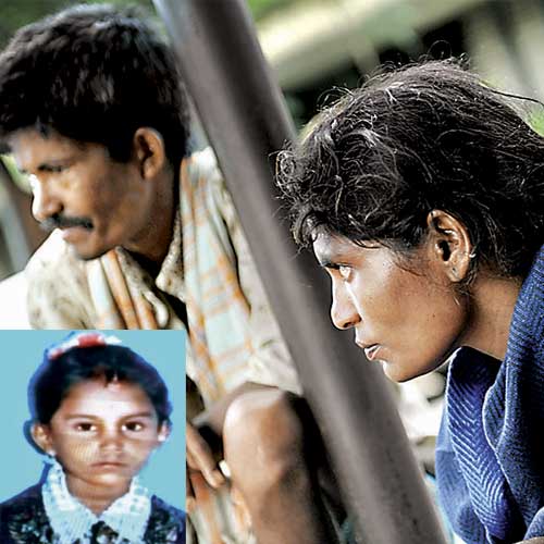 Parents of Anusha (inset), Ashwathappa and Venkatalakshmamma, sit outside Victoria Hospital on Wednesday morning. Anusha, who fell into a vessel containing hot sambar on Tuesday, died on Wednesday.