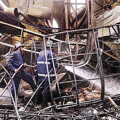 Firemen douse the fire which broke out at Filmcity in Goregaon on Wednesday.