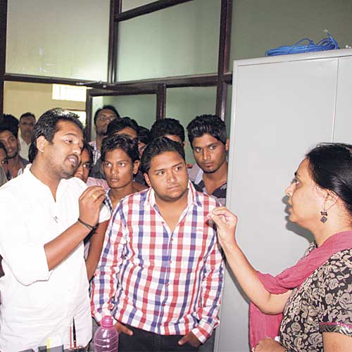 NSUI activists in a verbal spat with a college official on Wednesday.