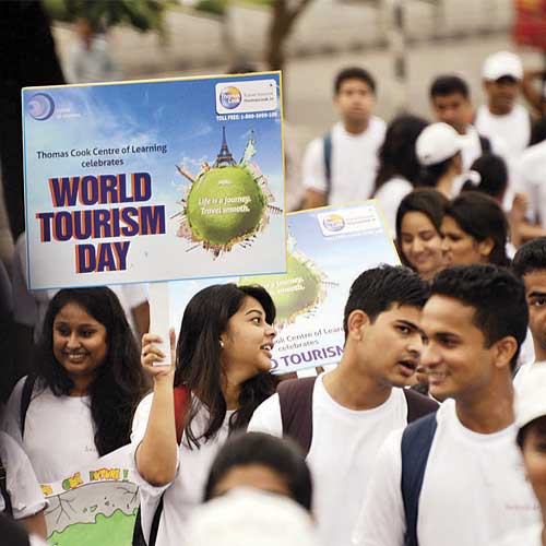 To celebrate World Tourism Day, college students participate in the Incredible India Tourism Walk from Nariman Point to Girgaum Chowpatty on Friday. The event was organised by the Ministry of Tourism.