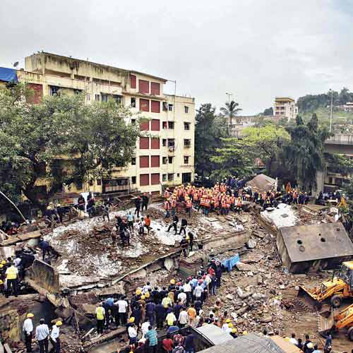 Rescue operation being carried out at the collapse site in Mazgaon on Friday.