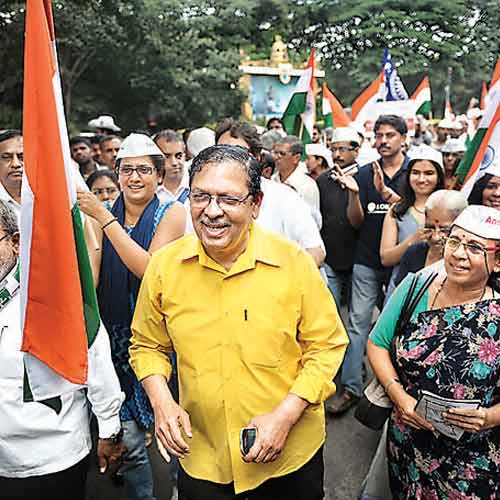 The former Lokayukta judge participated in a walk on Wednesday, rallying for transparency in the government.