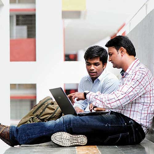 Jaideep Pathare and his protege Akshay Shinde on the premises of AISSMS College.