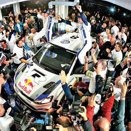 Sebastian Ogier, Julien Ingrassia and team celebrate their win