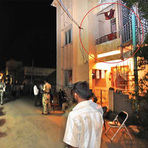 One of the houses (circled) where the alleged terror suspects had stocked weapons .