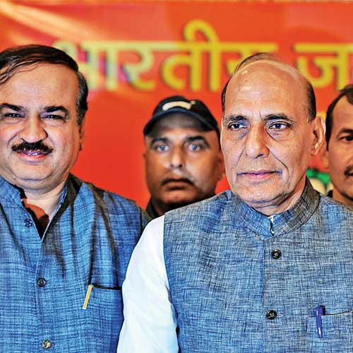Rajnath Singh (right) stressed that the saffron alliance's partnership with the RPI would not fall apart.