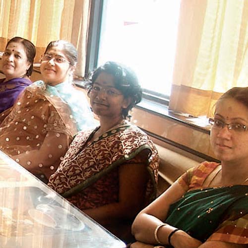 Staff of Maniams during a meeting