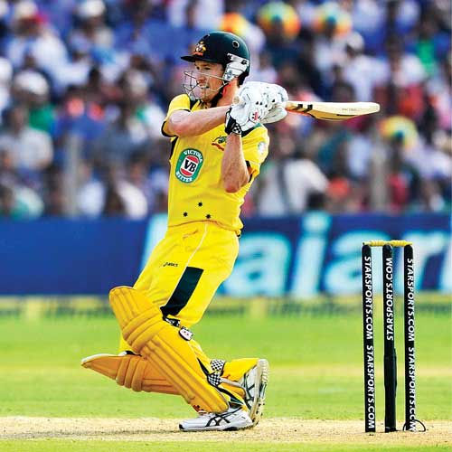 Australia skipper George Bailey pulls one to the fence during his 85-run knock against India in Pune on Sunday.