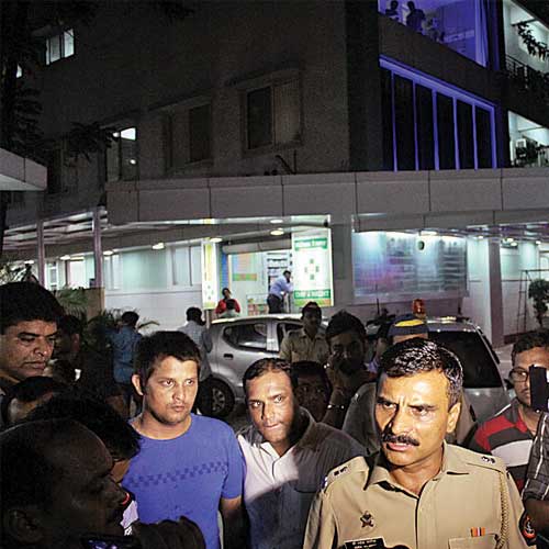 Police outside the hospital where the victim is undergoing treatment.