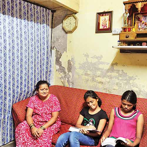 Pranali Pophale with her daughters at New Haji Kasam Chawl.
