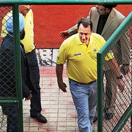 Terry Walsh enters the MHA Stadium in Mumbai on Saturday.