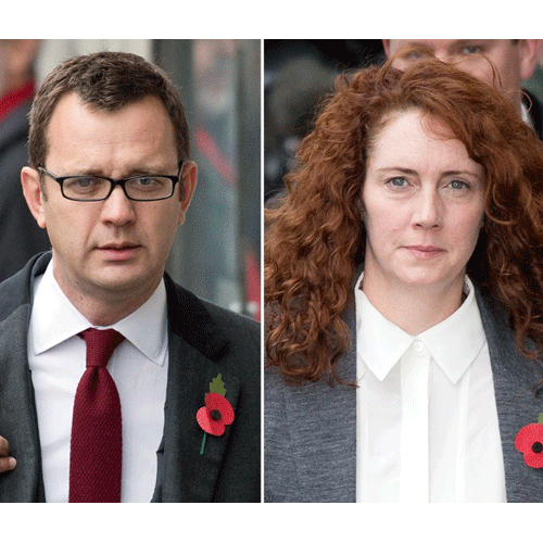 Former News of the World editor and Downing Street communications chief Andy Coulson (L) and Rebekah Brooks (R), former News International chief executive, arriving for the phone-hacking trial at the Old Bailey court in London.