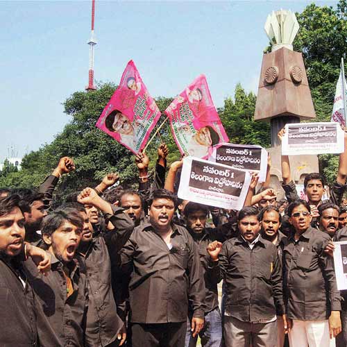 Students shout slogans during a protest in support of the Telangana Joint Action Committee's Black Day call for Telangana in Hyderabad on Friday.