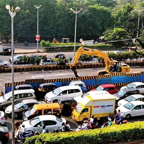 Traffic comes to a halt on the WEH near Kherwadi Junction on Friday following the closure of three lanes to facilitate flyover construction.