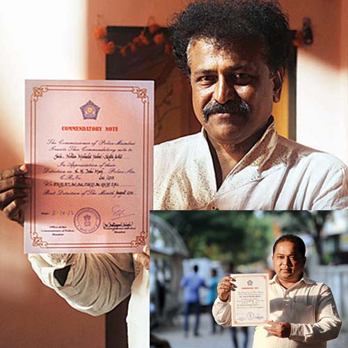 (L-R) Nitin Yadav and Siddiq Shaik display their certificates given by Mumbai police commissioner Dr Satyapal Singh on Wednesday