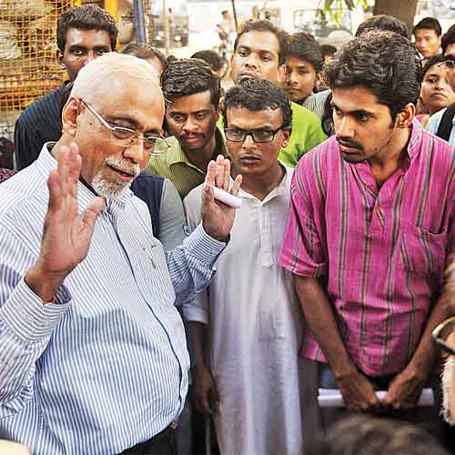 TISS director S Parshuraman talks to student activists outside the Trombay police station on Thursday.