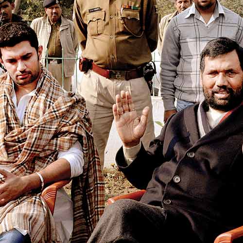 Paswan with his son Chirag in Patna on Tuesday. The  LJP leader says he has asked the Congress to take a decision on the alliance by the end of January.