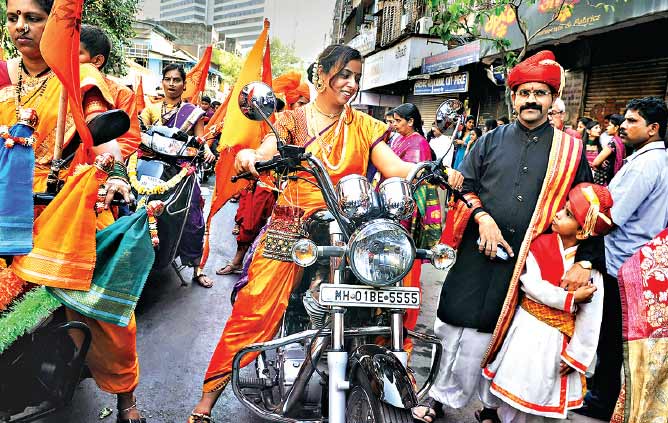 Clad in traditional nine-yard saris, women take to the streets to celebrate Gudi Padwa at Girgaum in Mumbai Clad in traditional nine-yard saris, women take to the streets to celebrate Gudi Padwa at Girgaum in Mumbai