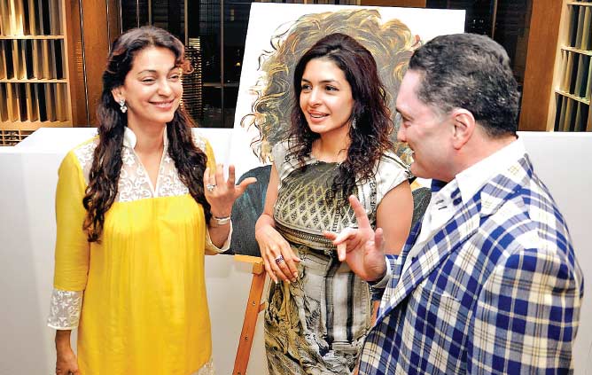 JUHI CHAWLA shares a joke with GAUTAM SINGHANIA at a private preview of NAWAZ MODI SINGHANIA’S solo painting exhibition at Warden Road on Saturday JUHI CHAWLA shares a joke with GAUTAM SINGHANIA at a private preview of NAWAZ MODI SINGHANIA’S solo painting exhibition at Warden Road on Saturday