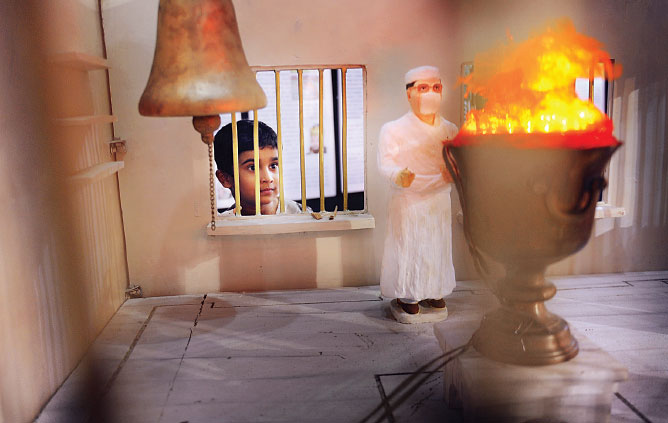 A child looks at a model of an agiary at an exhibition — Chronicles of Zoroastrianism — organised by Cyrus Dastoor at Albless Baug in Charni Road on Thursday. The exhibition is on till April 13 —Hemant Padalkar/dna A child looks at a model of an agiary at an exhibition — Chronicles of Zoroastrianism — organised by Cyrus Dastoor at Albless Baug in Charni Road on Thursday. The exhibition is on till April 13 —Hemant Padalkar/dna