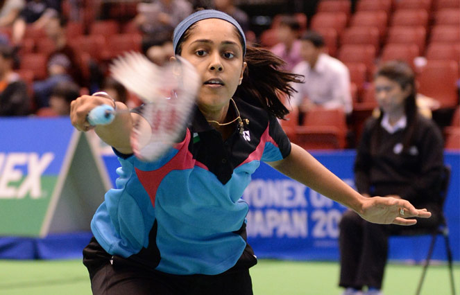 India's Tanvi Lad hits a return against China's Liu Xin during their women's singles second round match at the Japan Open badminton tournament in Tokyo on June 12, 2014. Image: AFP/Kazhhiro Nogi tanvi-lal-badminton