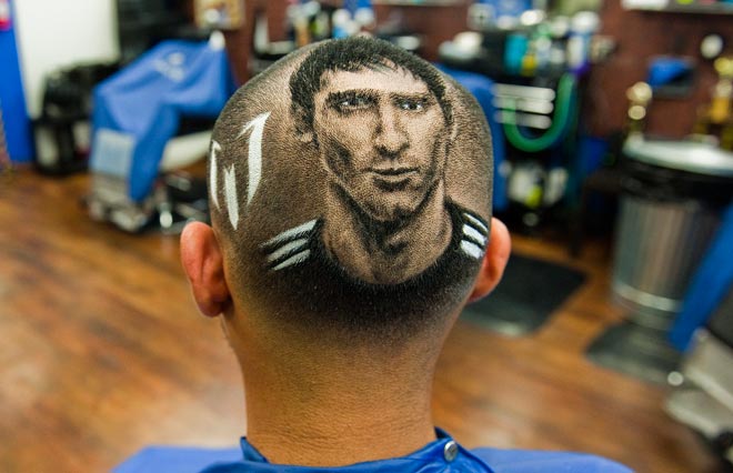 An image of an Argentine soccer player Lionel Messi is cut onto the head of a customer ahead of tomorrow's World Cup match between Argentina and Switzerland at the barbershop run by Hair Artist and Master Barber Rob Ferrel known as "Rob the Original" in San Antonio, Texas June 30, 2014. REUTERS/Ashley Landis An image of an Argentine soccer player Lionel Messi is cut onto the head of a customer ahead of tomorrow's World Cup match between Argentina and Switzerland at the barbershop run by Hair Artist and Master Barber Rob Ferrel known as "Rob the Original" in San Antonio, Texas June 30, 2014. REUTERS/Ashley Landis