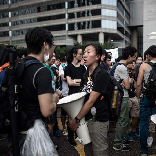 Protests in Hong Kong continue in torrential rain even as National.