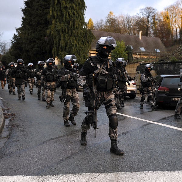 Live: Charlie Hebdo shootout suspects take one hostage in near.