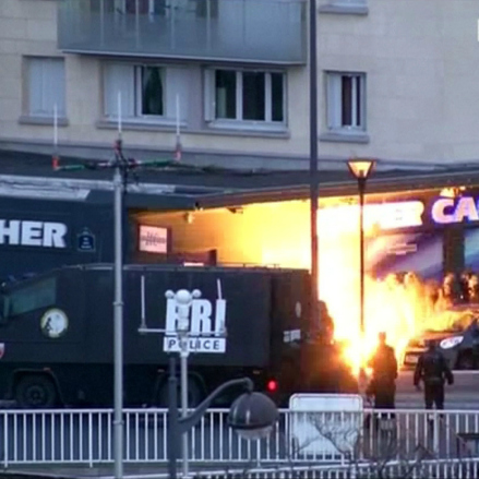 French forces kill Charlie Hebdo attack suspects, four hostages.